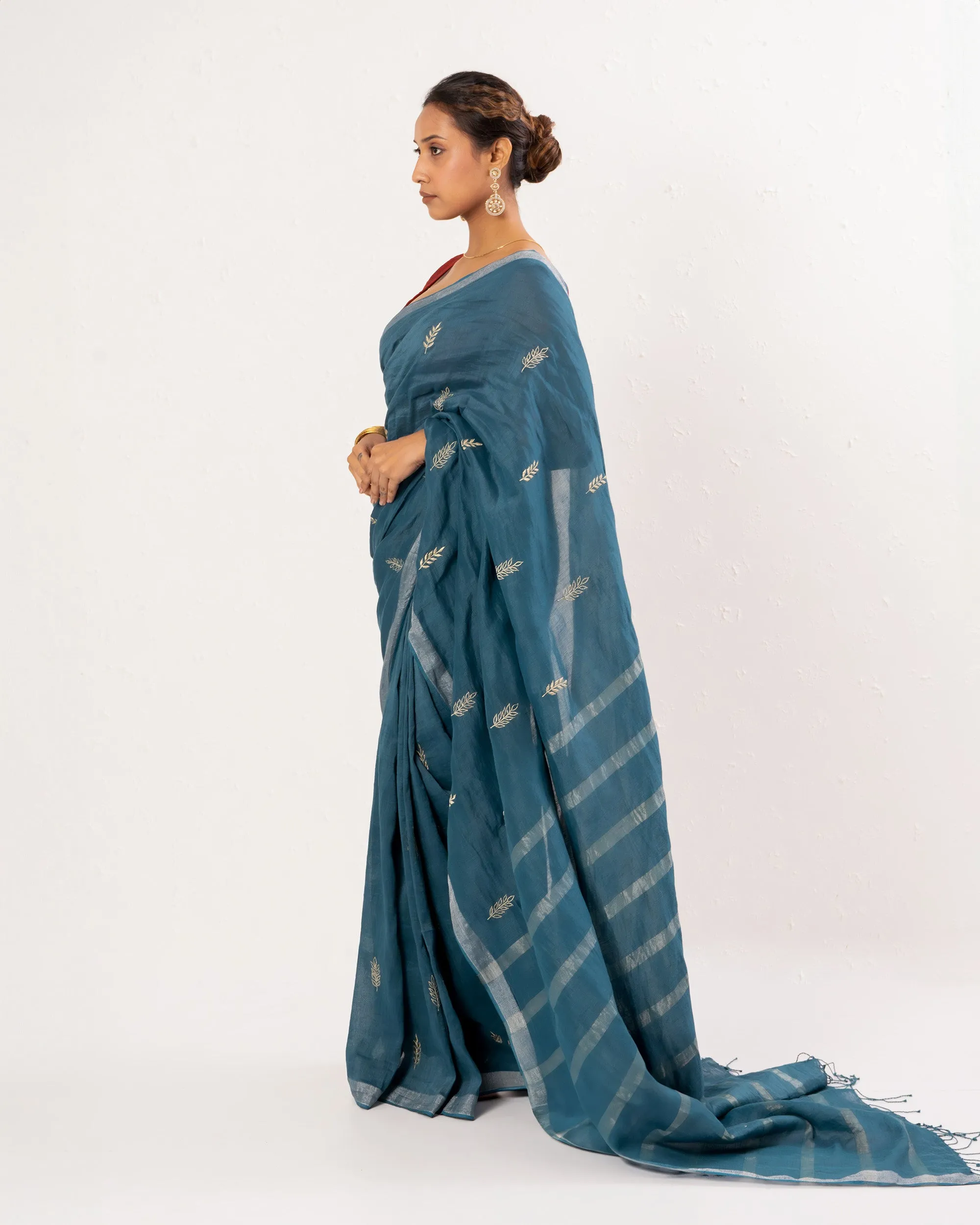 Blue embroidered handwoven linen saree